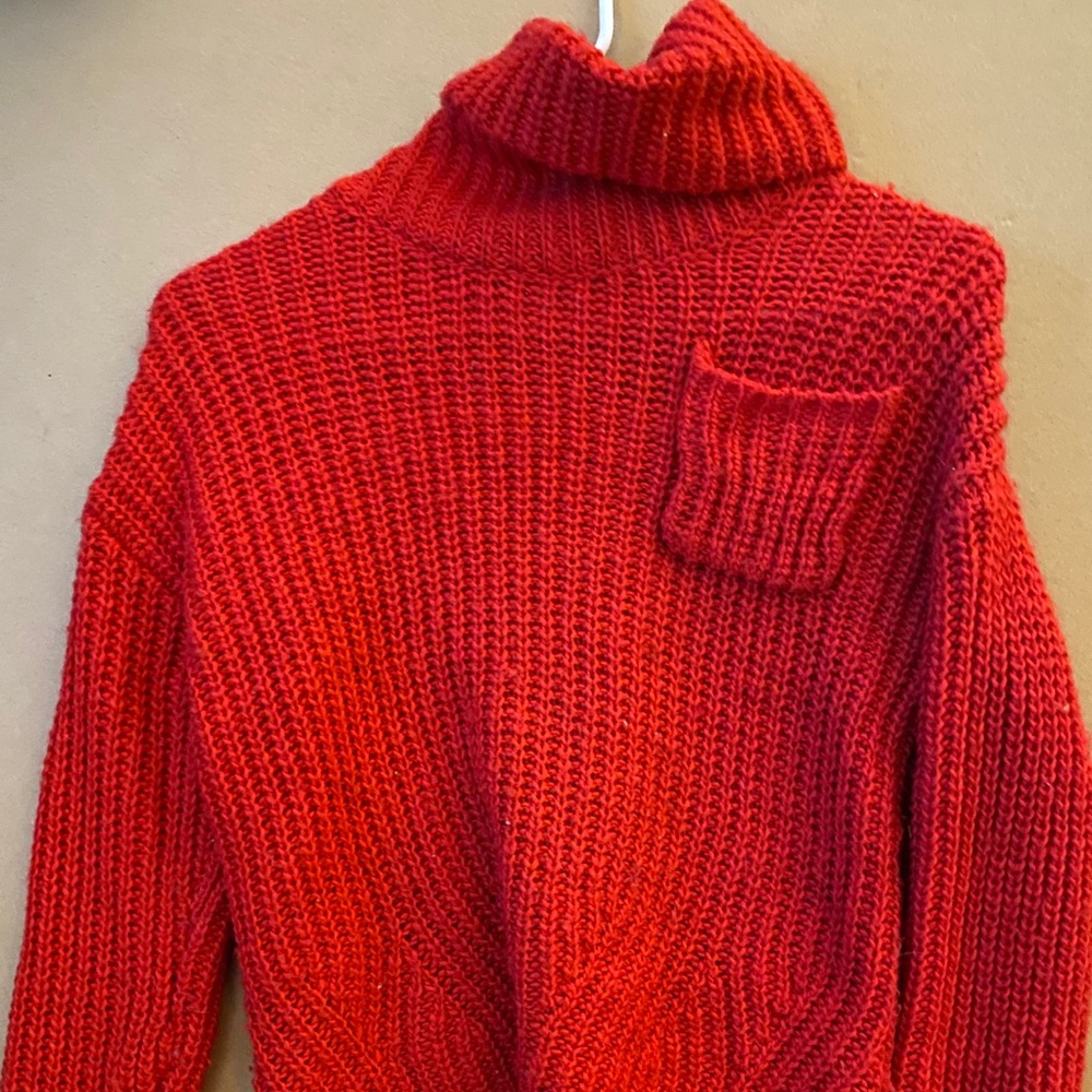 Red turtleneck sweater
